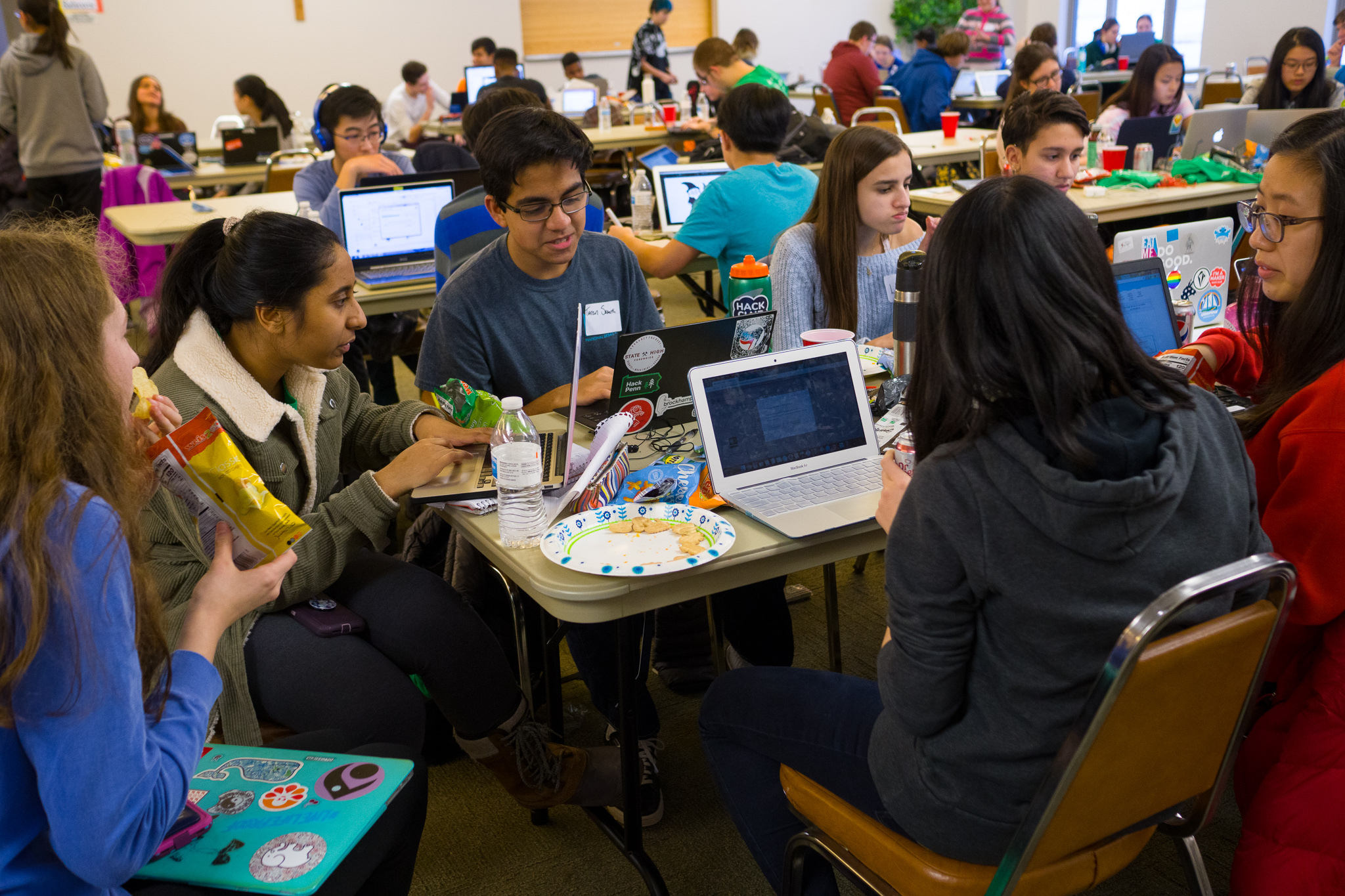 Students coding at a Hack Club event